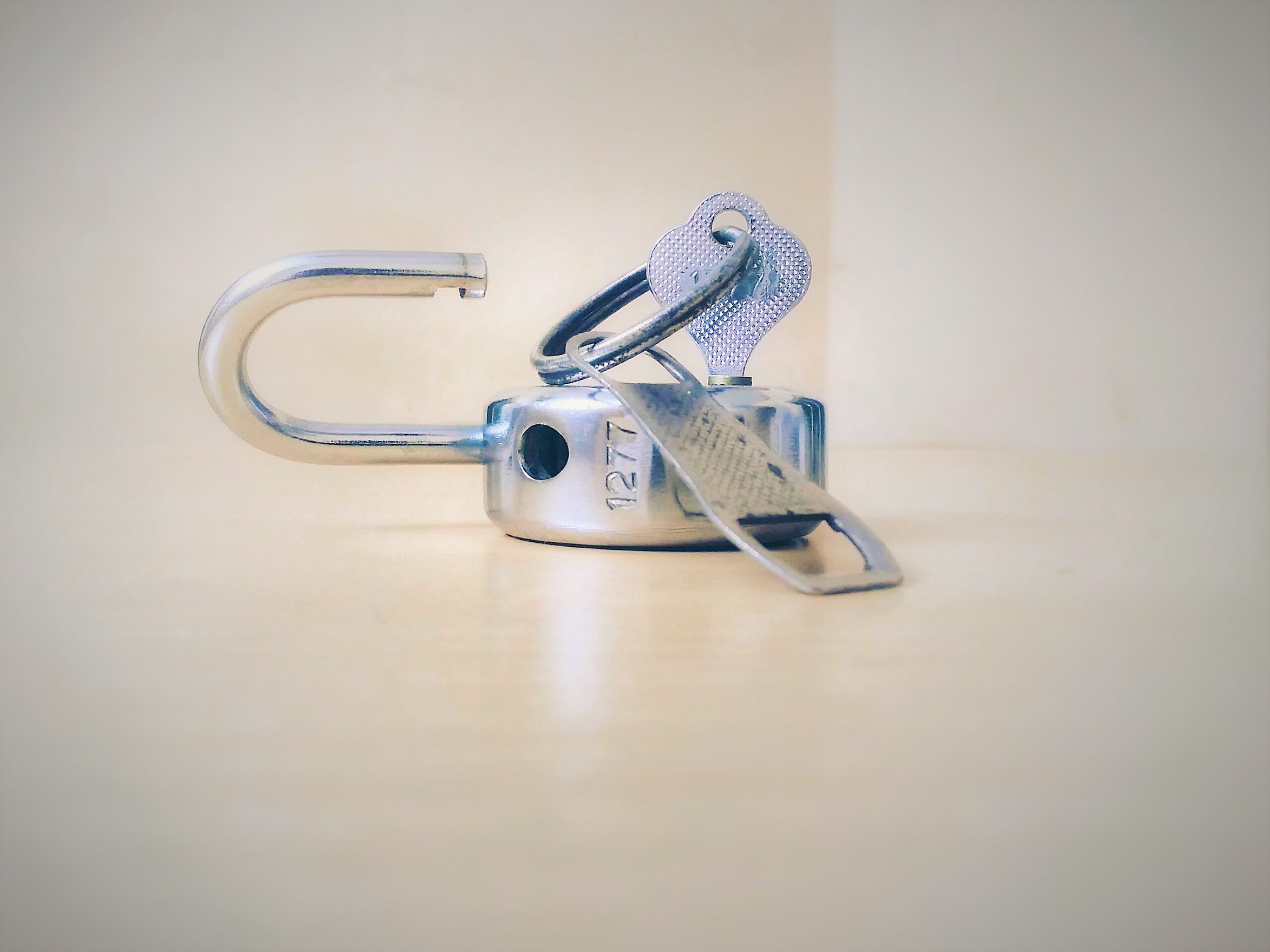 padlock & key indicating freedom from unwanted habits such as procrastination, emotional eating, weight control, stress etc.